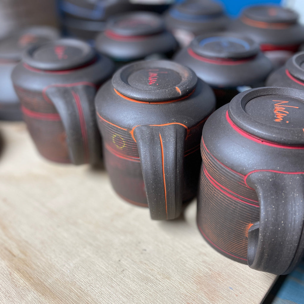 Detail of hand-built mugs