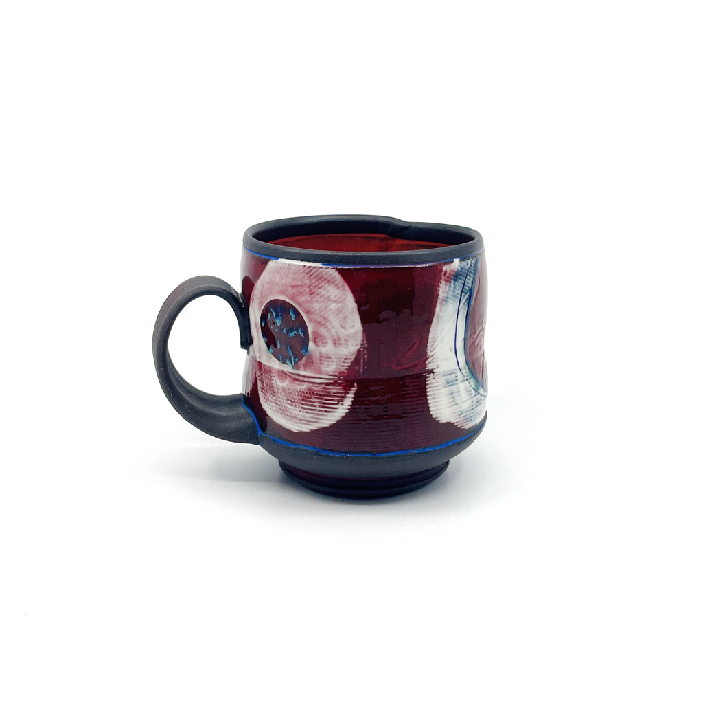 Hand-built pottery mug by potter Naomi Clement